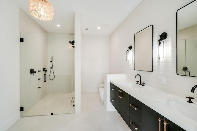 bathroom with toilet, an enclosed shower, tile walls, a bidet, and vanity