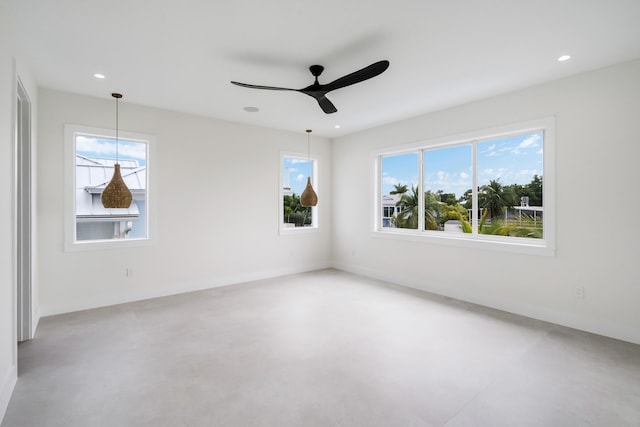 spare room featuring ceiling fan