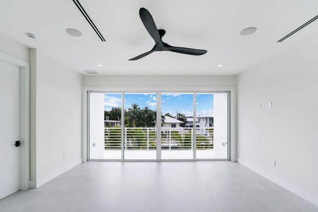 unfurnished room with ceiling fan