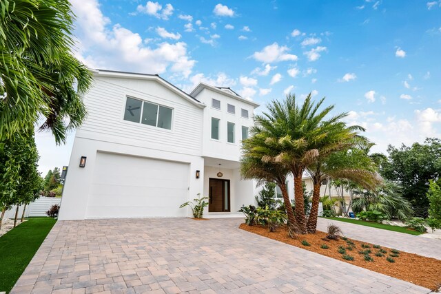 view of front of home with a garage