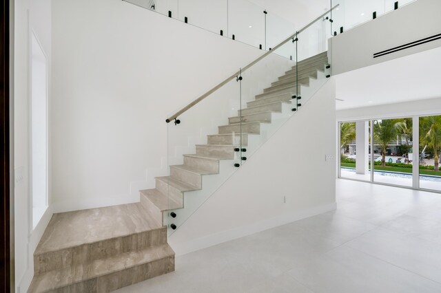 stairs with a towering ceiling