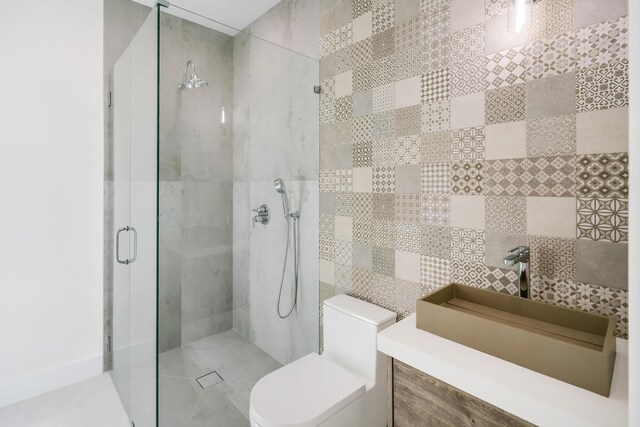 bathroom featuring sink, tile walls, an enclosed shower, and toilet