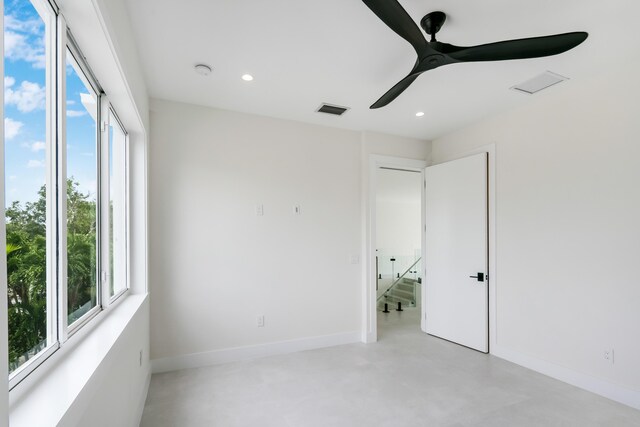 spare room with ceiling fan