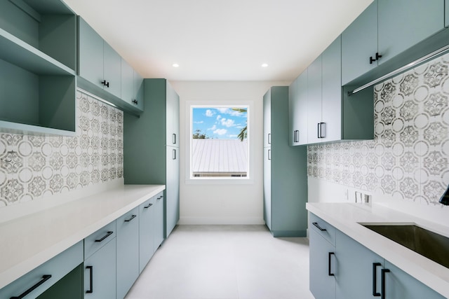 kitchen featuring sink and decorative backsplash