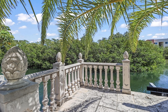 view of patio featuring a water view