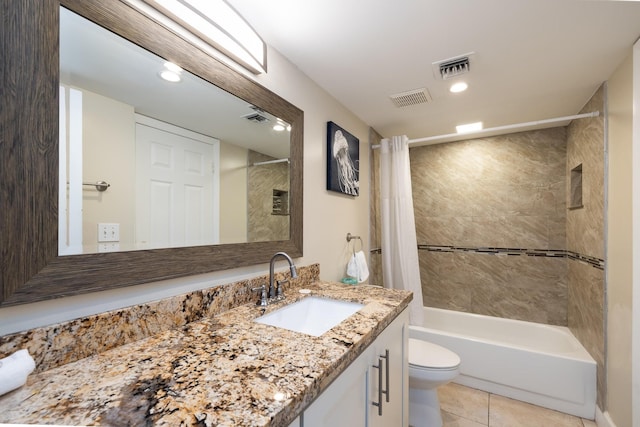 full bathroom with vanity, tile patterned floors, shower / bath combination with curtain, and toilet