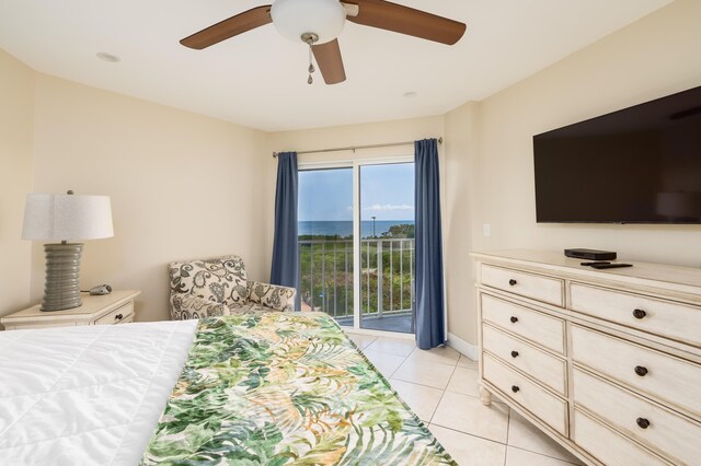 tiled bedroom with access to exterior and ceiling fan