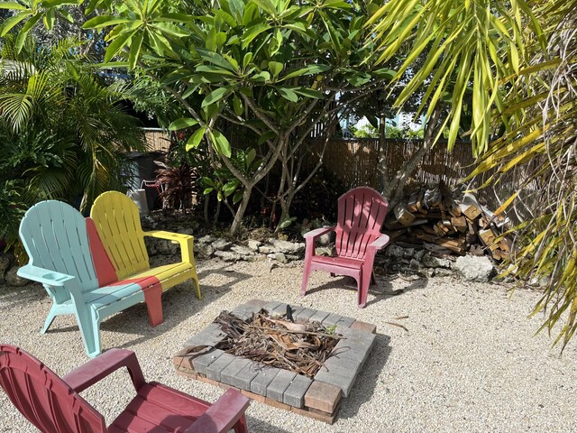 view of patio / terrace with an outdoor fire pit