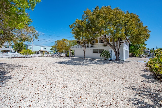 view of front of house with fence