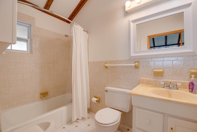 full bath with vanity, a wainscoted wall, tile walls, toilet, and shower / tub combo with curtain