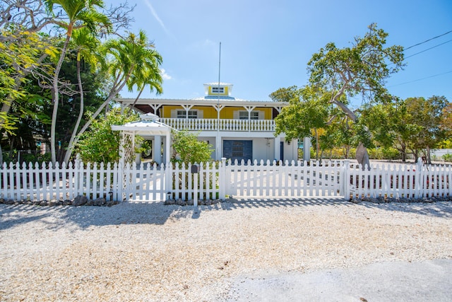 view of front of property with a gate and a fenced front yard