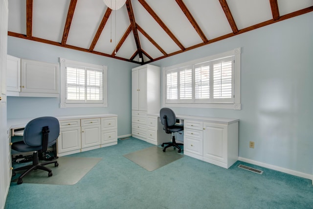 office with visible vents, baseboards, high vaulted ceiling, beamed ceiling, and light colored carpet