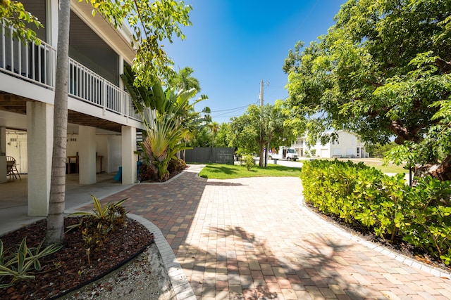 view of home's community with a patio area