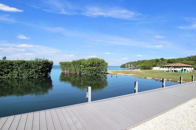 dock area featuring a gazebo and a water view