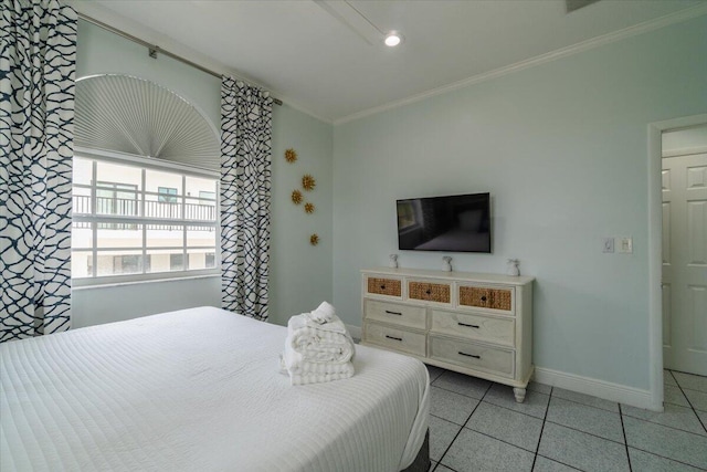 bedroom featuring light tile patterned floors and ornamental molding