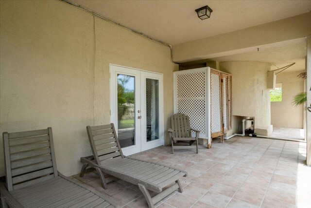 view of patio featuring french doors