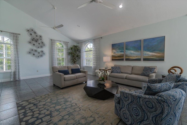 living room with high vaulted ceiling and ceiling fan