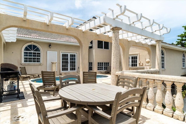 view of patio / terrace featuring an outdoor bar and a pergola