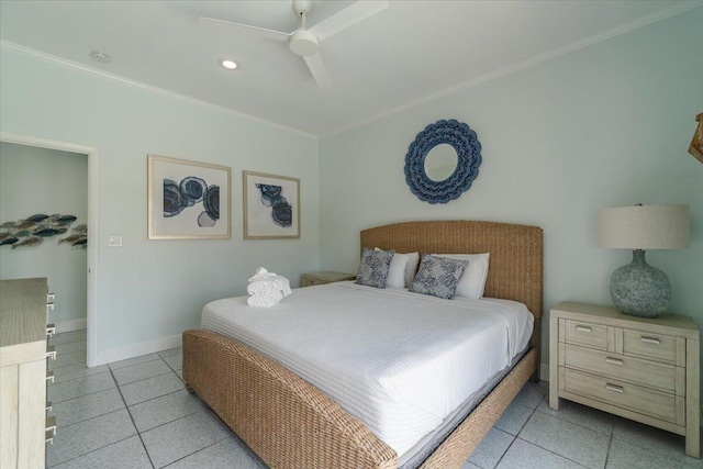 tiled bedroom with ornamental molding and ceiling fan