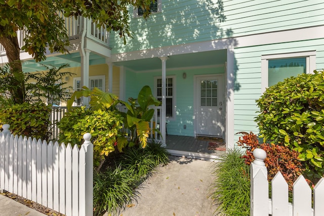 doorway to property featuring a balcony and radiator