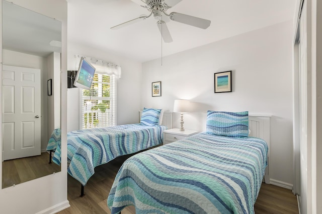 bedroom featuring ceiling fan and hardwood / wood-style floors