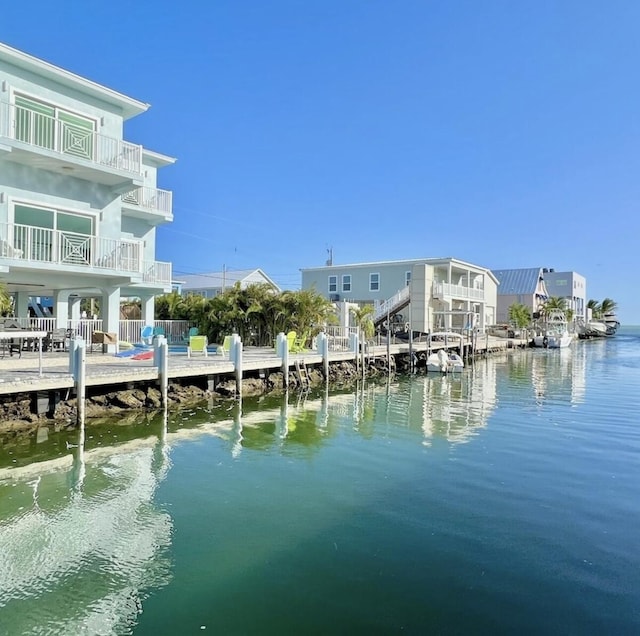 dock area with a water view