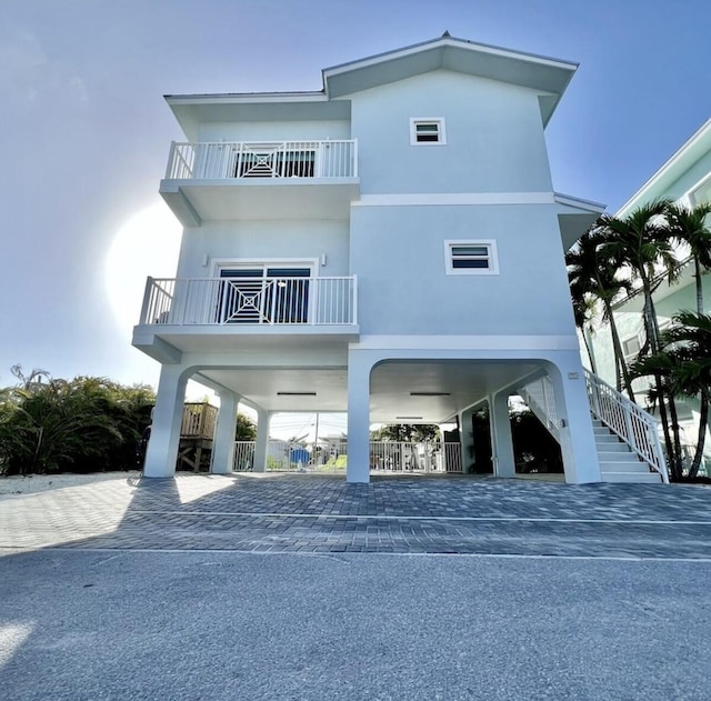 view of front of property with a carport