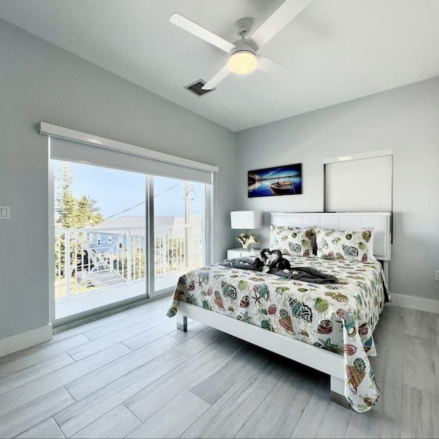 bedroom with access to outside, ceiling fan, and light hardwood / wood-style flooring