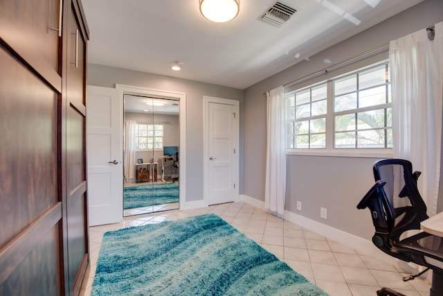 office featuring light tile patterned flooring