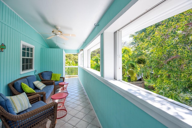 balcony featuring ceiling fan