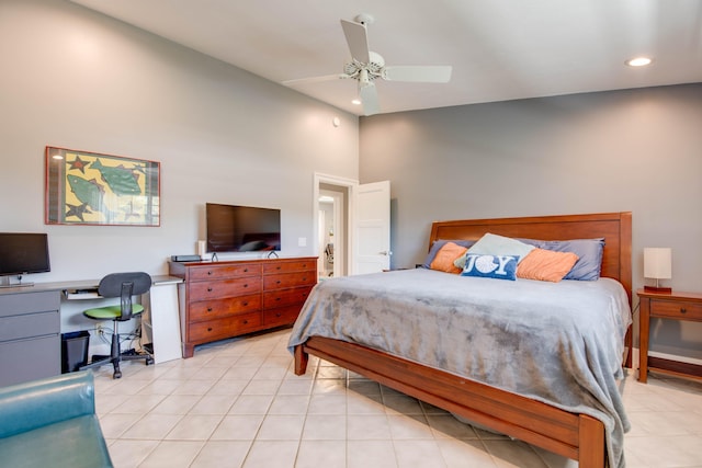 bedroom featuring lofted ceiling, light tile patterned floors, and ceiling fan