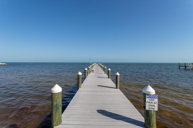 view of dock with a water view