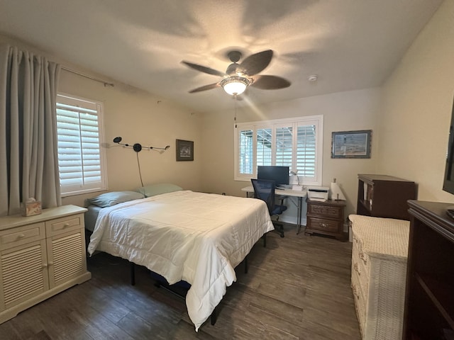 349 Mahogany Dr, Key Largo, FL 33037 - bedroom with dark wood-style flooring, a desk, and ceiling fan