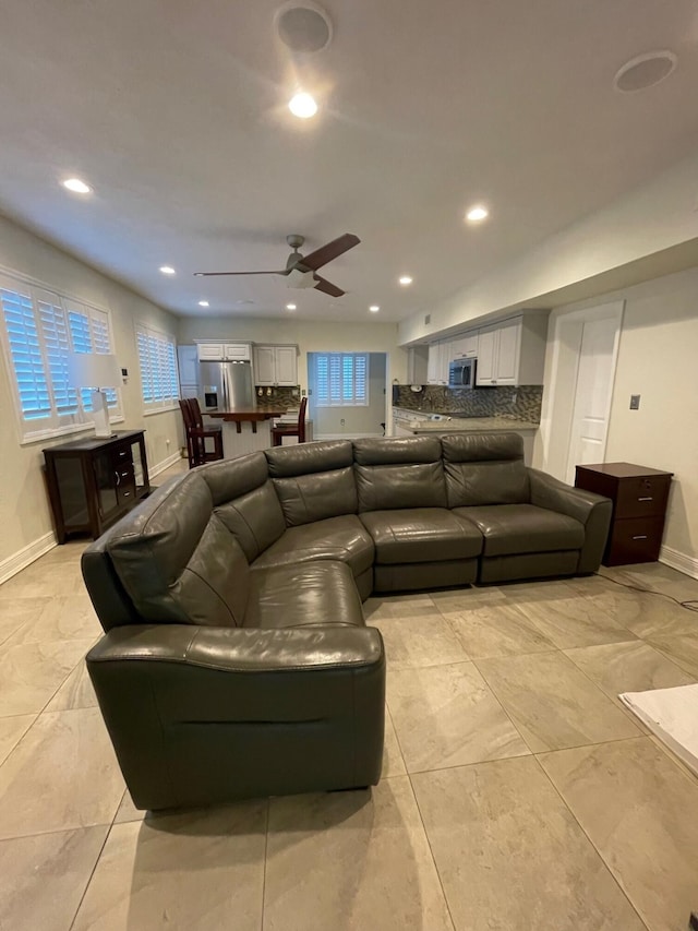 349 Mahogany Dr, Key Largo, FL 33037 - living room with a ceiling fan, recessed lighting, and light marble finish floors