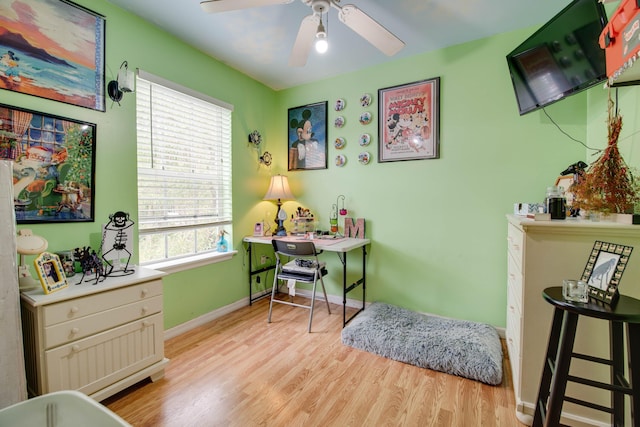 office with ceiling fan, light wood-style flooring, and baseboards