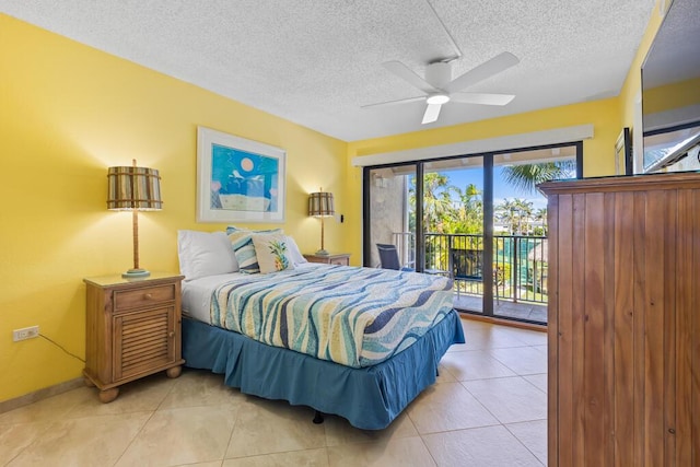 bedroom with ceiling fan, access to outside, a textured ceiling, and light tile patterned floors