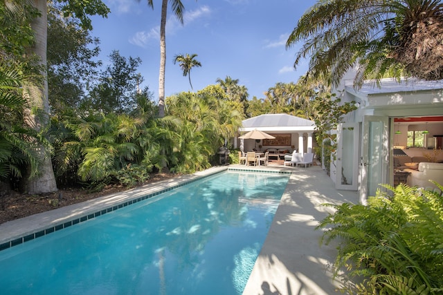 outdoor pool with a patio