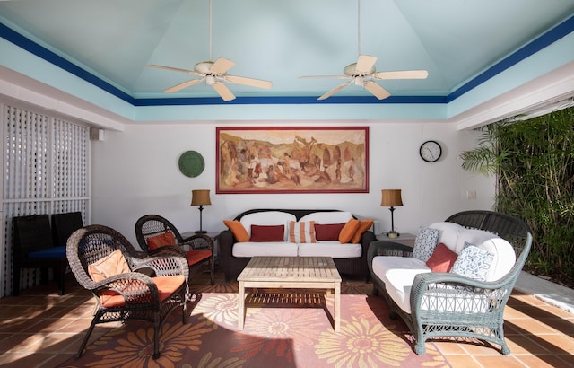 interior space featuring lofted ceiling, ceiling fan, and a fireplace