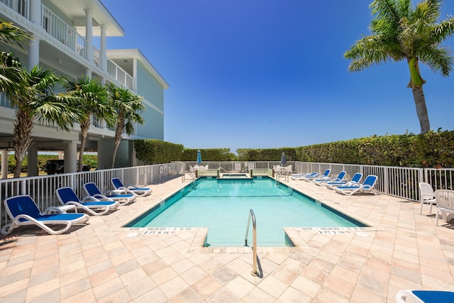 5960 Peninsular Ave Unit 108, Stock Island, FL 33040 - community pool with fence and a patio area
