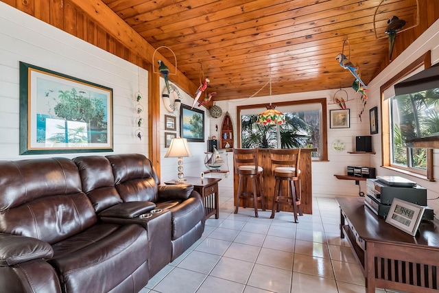 794 Narragansett Ln, Key Largo, FL 33037 - living area featuring wooden walls, light tile patterned floors, wood ceiling, a dry bar, and lofted ceiling