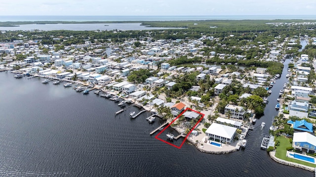 794 Narragansett Ln, Key Largo, FL 33037 - aerial perspective of suburban area with a large body of water and property boundaries highlighted