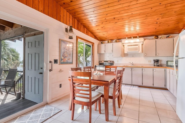 794 Narragansett Ln, Key Largo, FL 33037 - dining room featuring wooden ceiling, light tile patterned floors, and vaulted ceiling