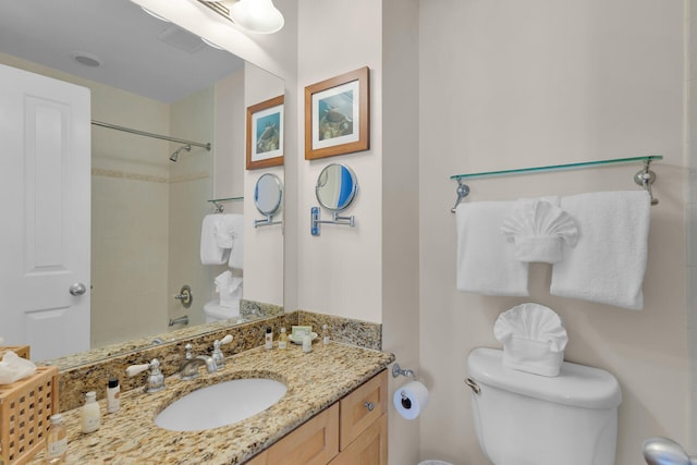 full bathroom featuring vanity, toilet, and bathing tub / shower combination