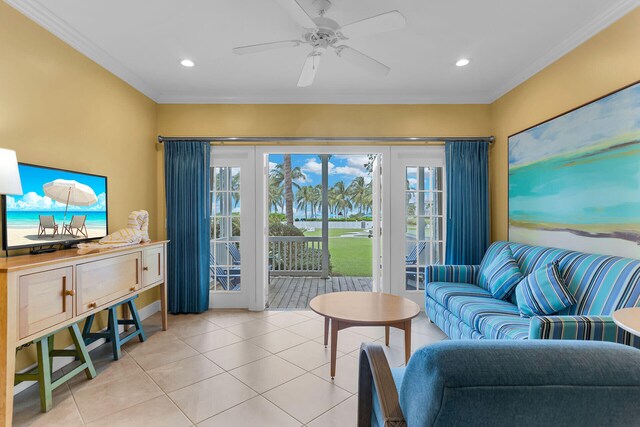 tiled living room with crown molding and ceiling fan