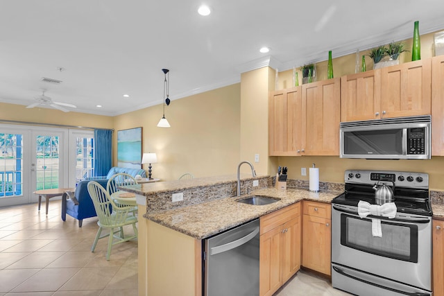 kitchen featuring sink, crown molding, stainless steel appliances, light brown cabinetry, and kitchen peninsula