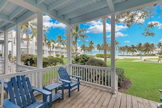 deck featuring a lawn