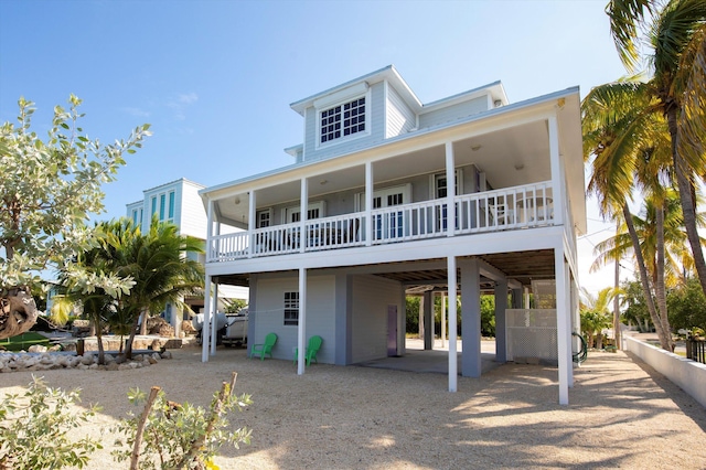 view of front of home with a carport