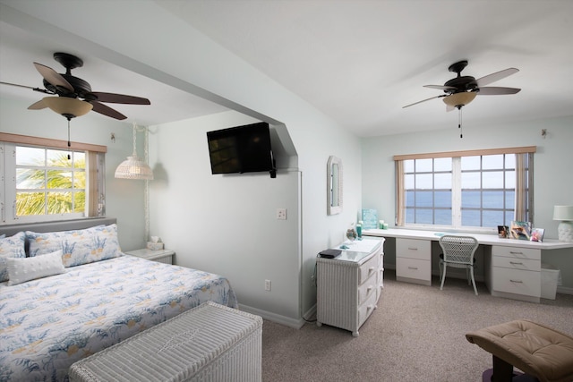 bedroom with light carpet and ceiling fan