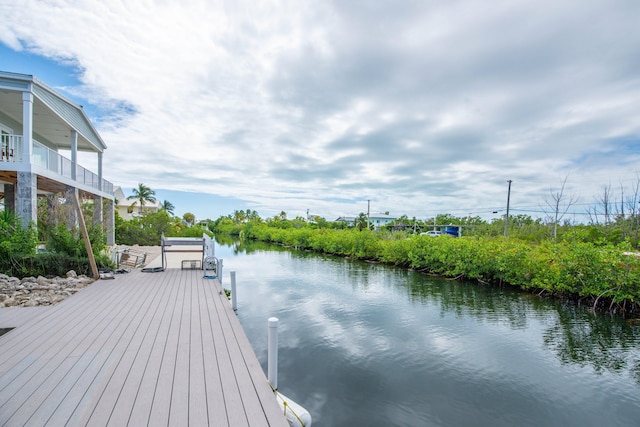 dock area with a water view