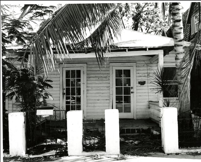 view of snow covered property entrance